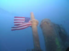 uss lagarto memorial service photo august 2005. stars and stripes from the tip of the conning tower at 200ft
