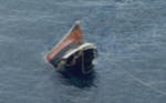 the honduran oil tanker playboy 3 sinking by the stirn after sustaining collision damage. the vessel was succesfully recovered.